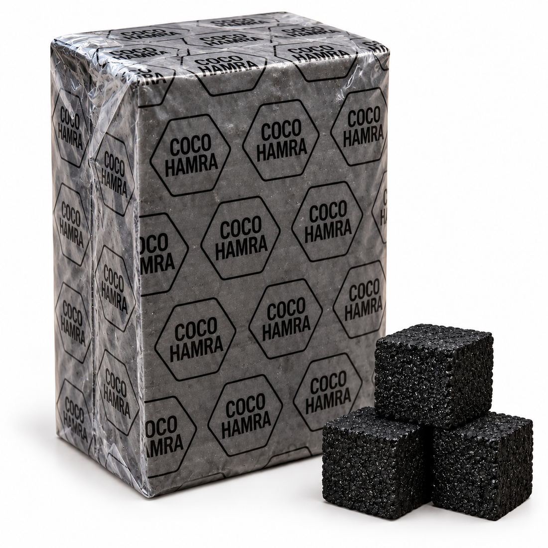 Coco Hamra 25mm natural coconut charcoal, 72 cubes in a 1kg branded plastic-wrapped pack with subtly visible cube texture and three loose charcoal cubes on a white background