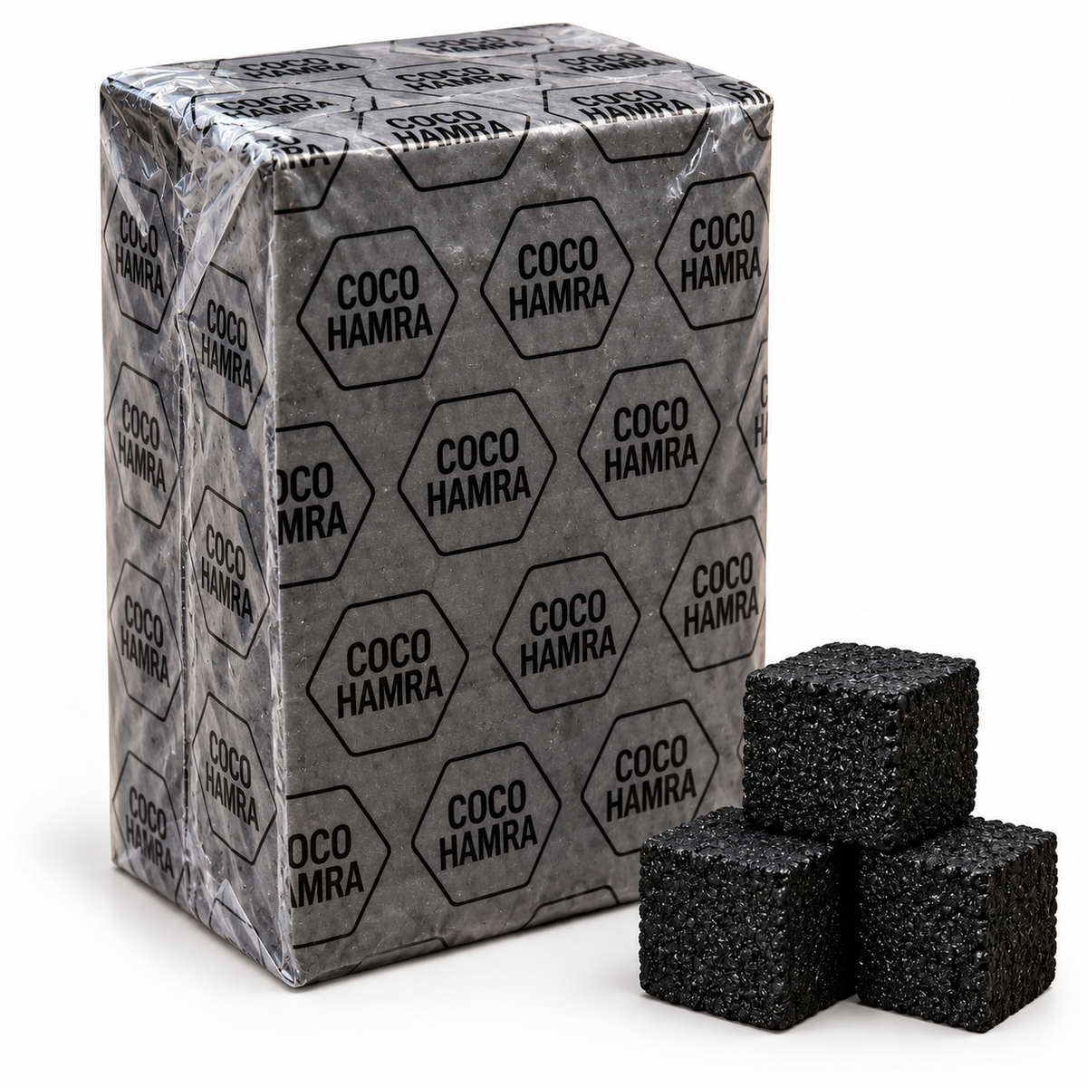 Coco Hamra 25mm natural coconut charcoal, 72 cubes in a 1kg branded plastic-wrapped pack with subtly visible cube texture and three loose charcoal cubes on a white background