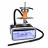 A hookah set on a white background, featuring a black and white base with a glowing blue light, an orange and silver metal mouthpiece, and a long black hose with a mouthpiece.