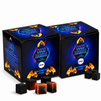 Two black boxes of Coco Hamra natural coconut energy capsules with flame graphics, shown with several black capsules in front on a white background.
