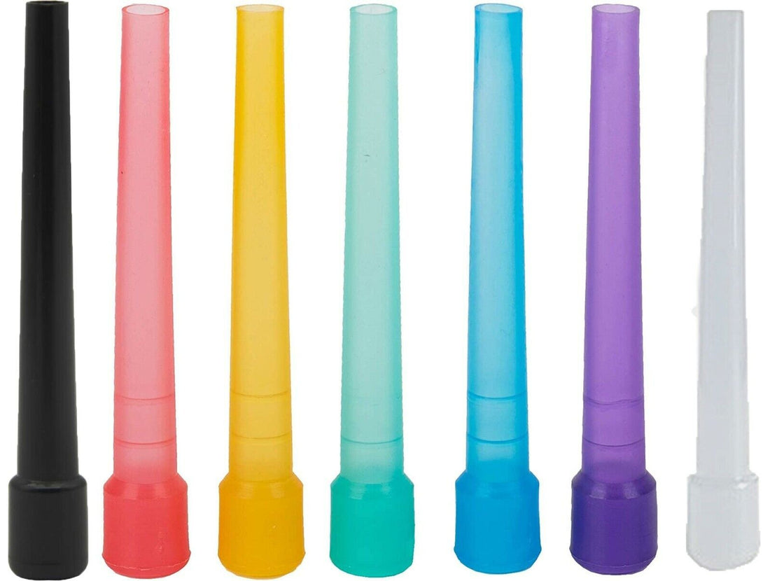 A collection of various colored male mouth tips for hookah or shisha, each tip is individually wrapped and colored tips are visible in black, pink, yellow, blue, green, and purple.